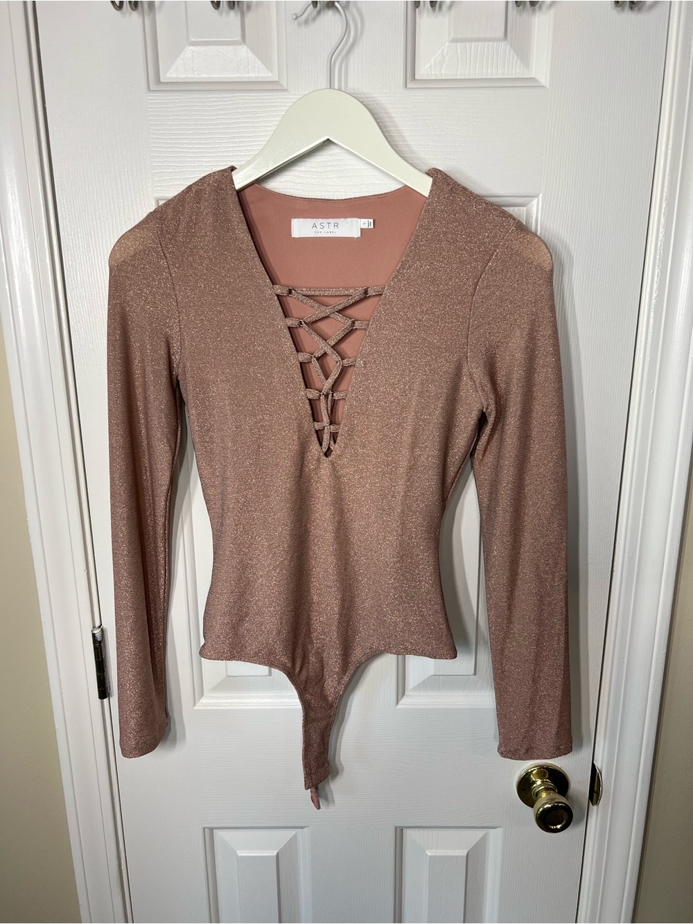 Astr Shimmery Rose Gold Lace-Up V-Neck Long Sleeve Bodysuit